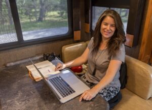 Camille Attell at her RV workstation